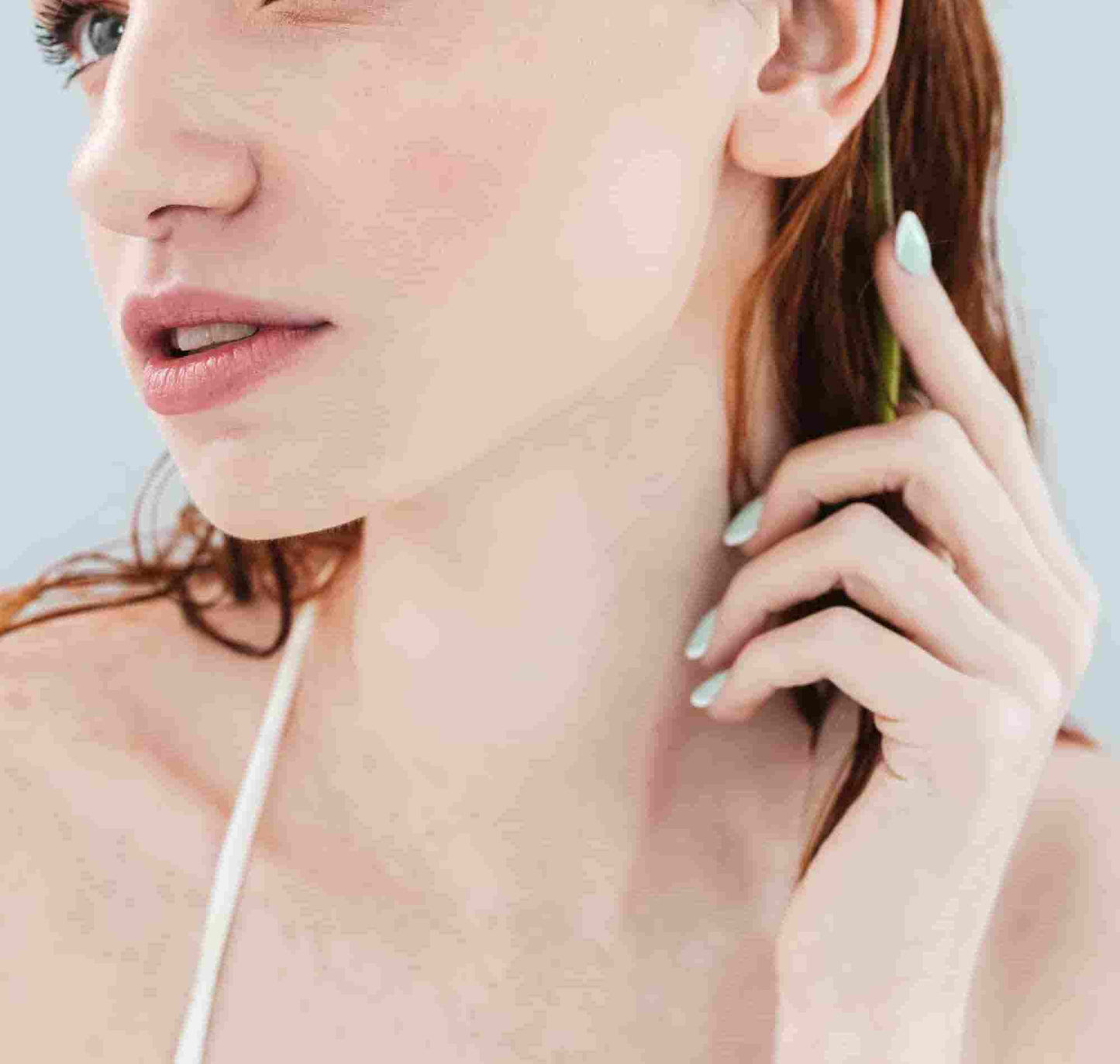 a girl wears handmade jewelries