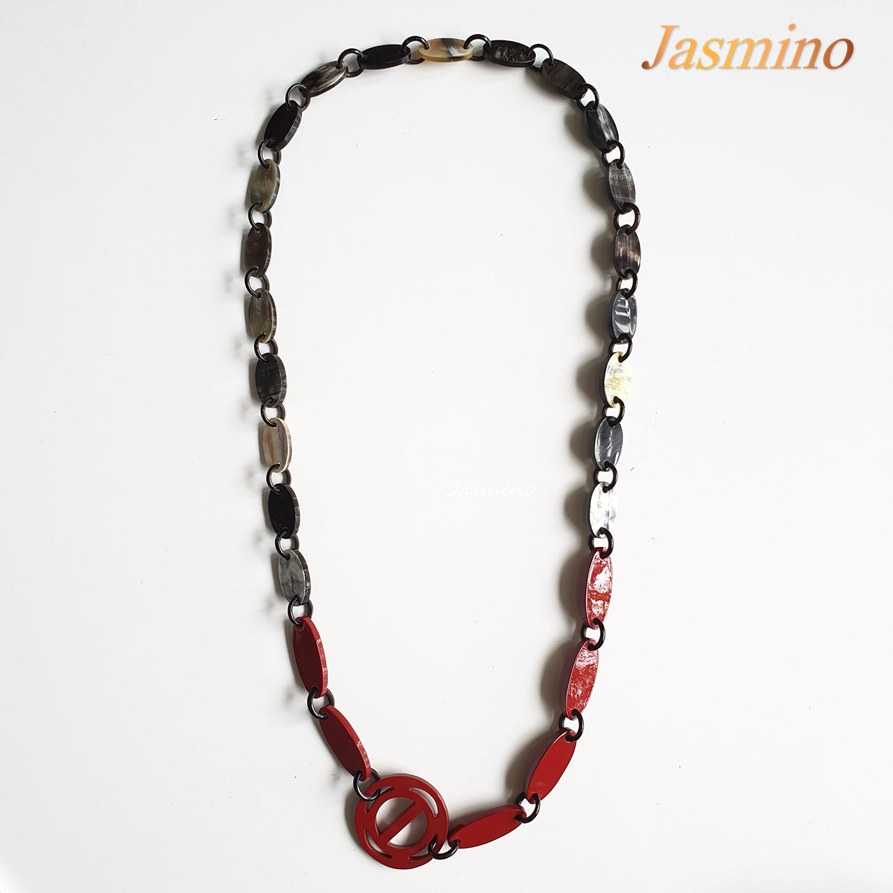 The necklace has some cherry pieces on the light background, a unique gift for her