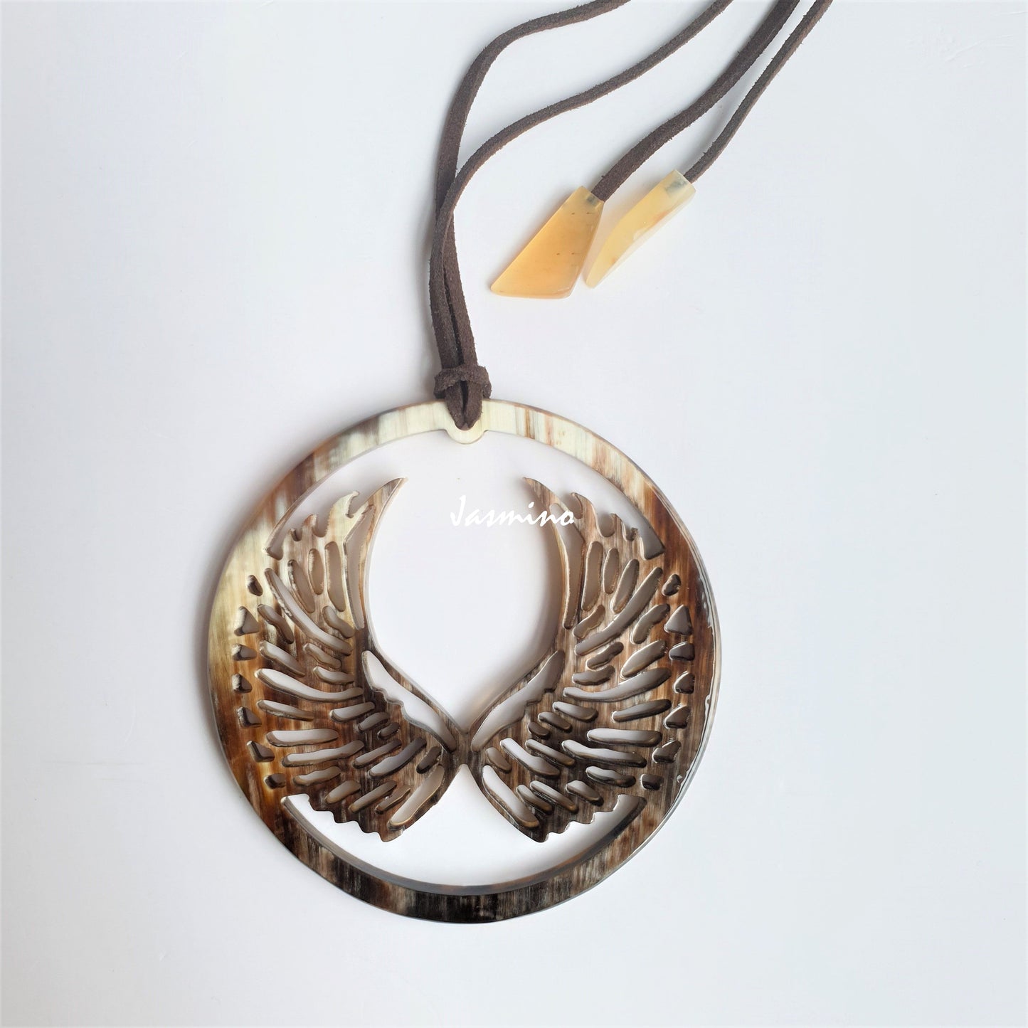 Jasmino Vintage angle wing circle pendant features a dark and light colour that is made of natural buffalo horn for men and women