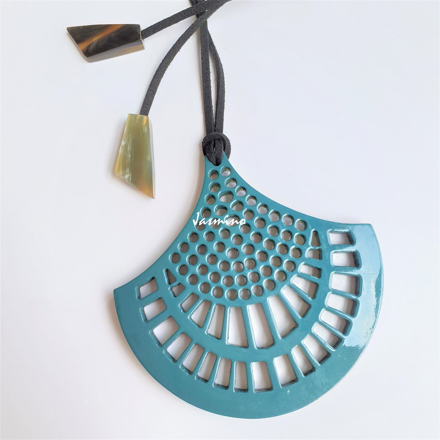Vintage unique handmade pendant features a blue colour made of natural buffalo horn for women