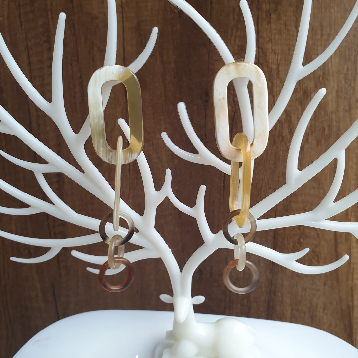 Handmade circle rectangle chain link earrings feature pale yellow in natural buffalo horn