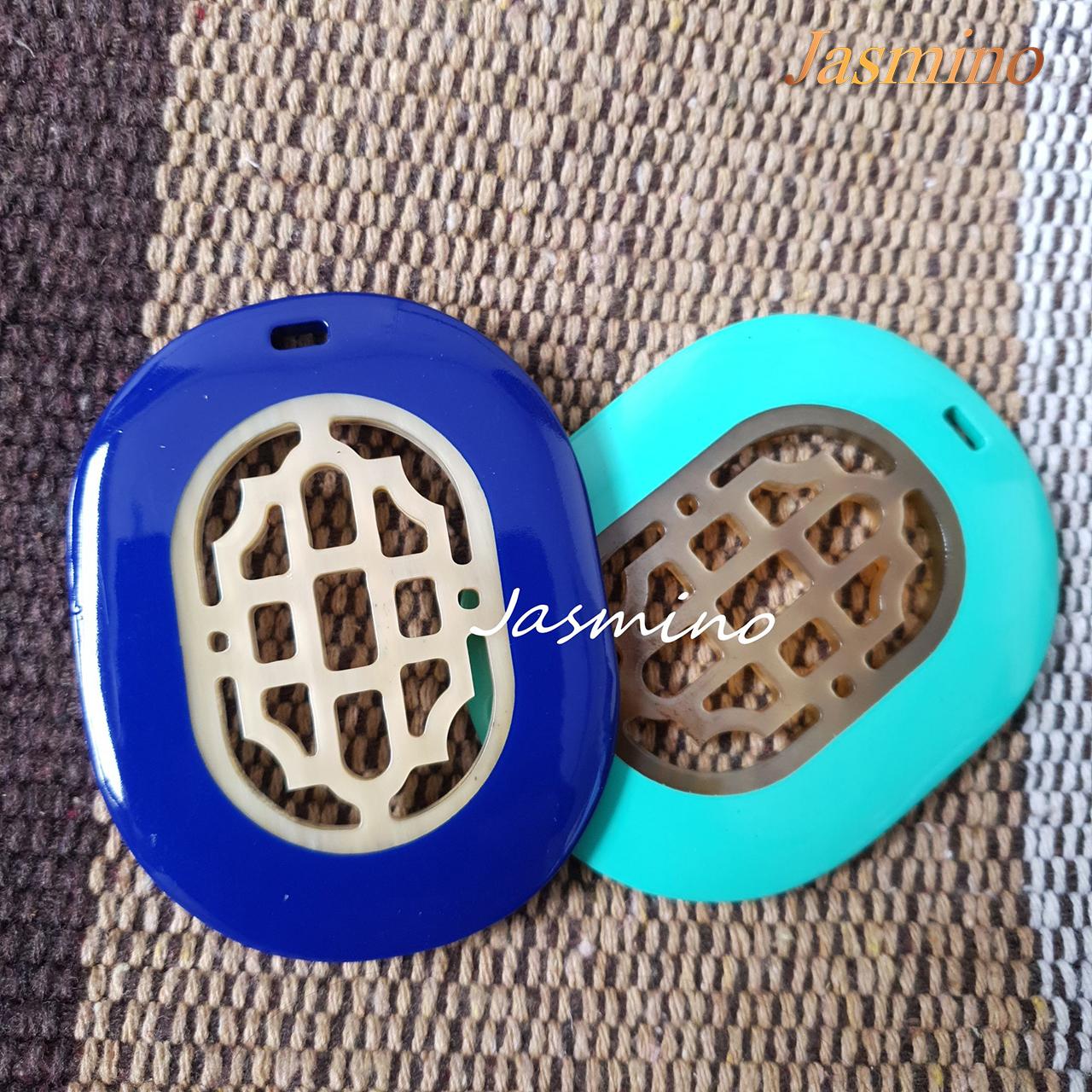 Two unique handmade oval pendants feature blue and turquoise that are made of natural buffalo horn for Thanksgiving gifts