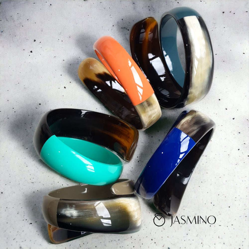 
                  
                    Jasmino unique handmade snake cuff bracelet features a turquoise half and a white half in natural buffalo horn for women on Thanksgiving
                  
                