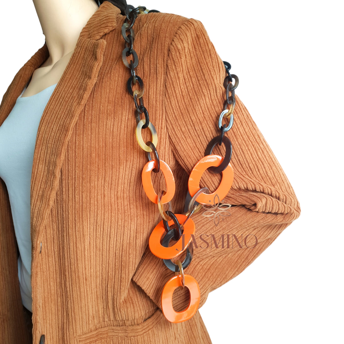model wearing hot orange buffalo horn necklace in natural light, unique gift for your friend on a white background