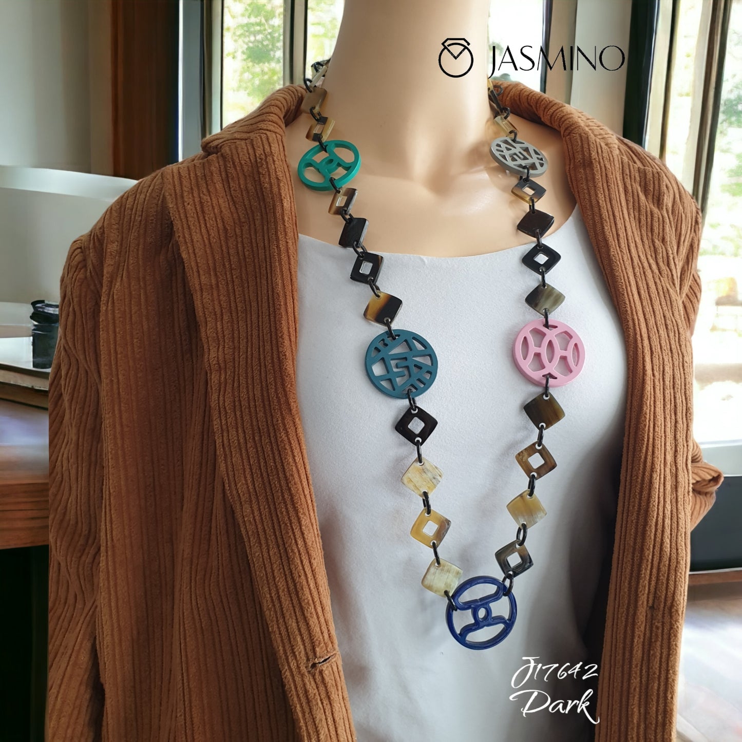 A model is wearing unique handmade Bohemian chain link diamond shaped chain link necklace jewelry in natural buffalo horn