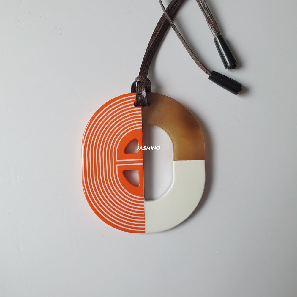 
                  
                    Jasmino Autumn Unique Two-Faced Orange Pendant Necklace Made By Natural Buffalo Horn
                  
                