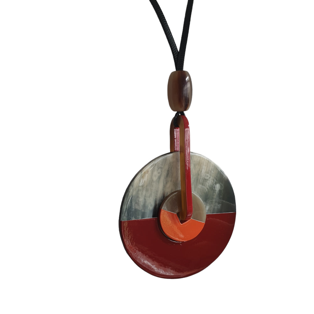 
                  
                    red buffalo horn pendant on the white ground
                  
                