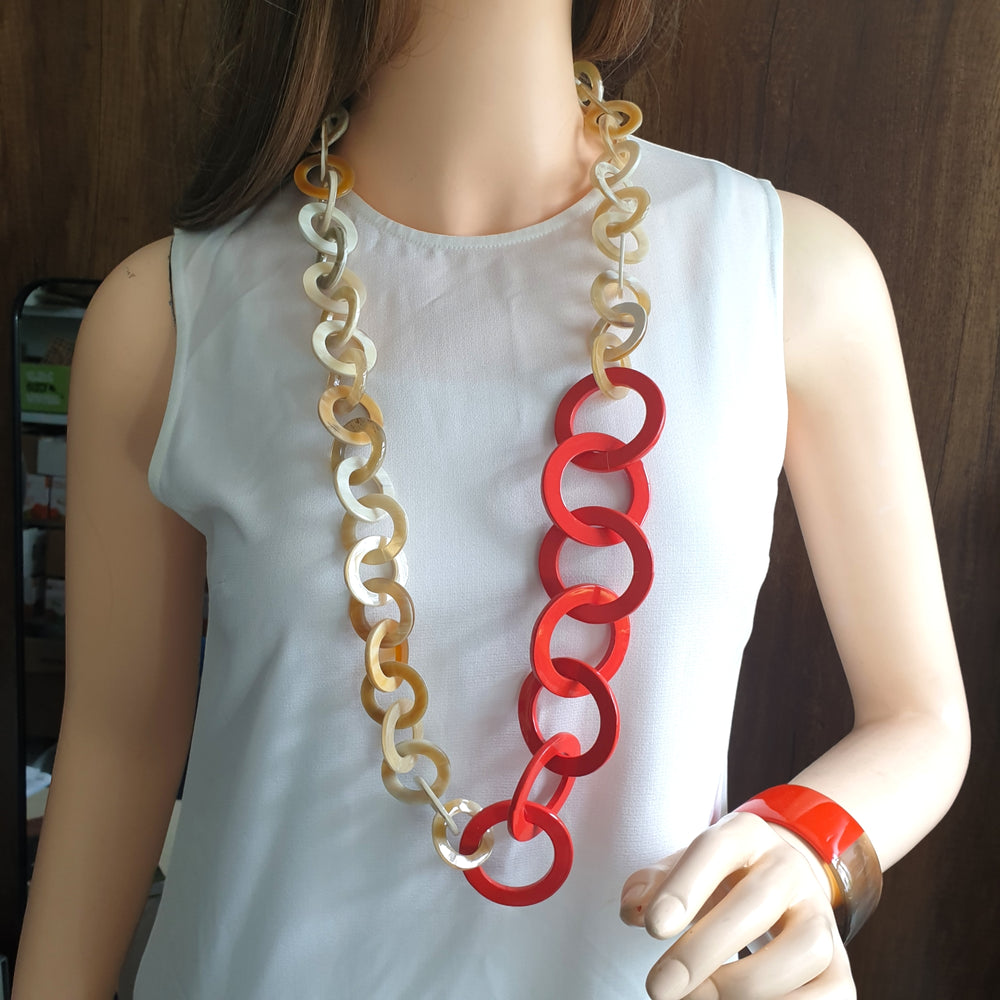 
                  
                    Horn Necklace in Orange Red Lacquer. Unique Jewelry by Jasmino
                  
                