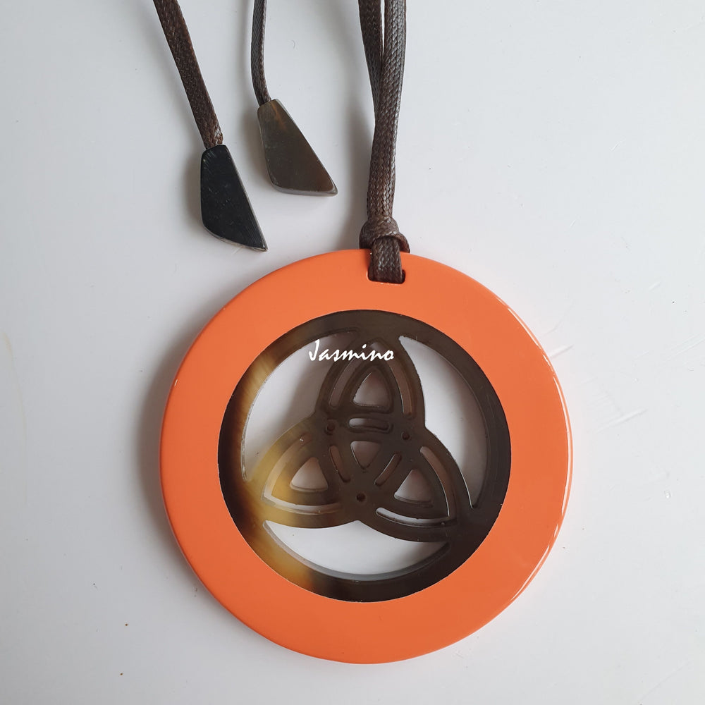 
                  
                    Jasmino unique handmade Vintage orange circle pendant in natural buffalo horn and a flower shape for Thanksgiving gifts
                  
                