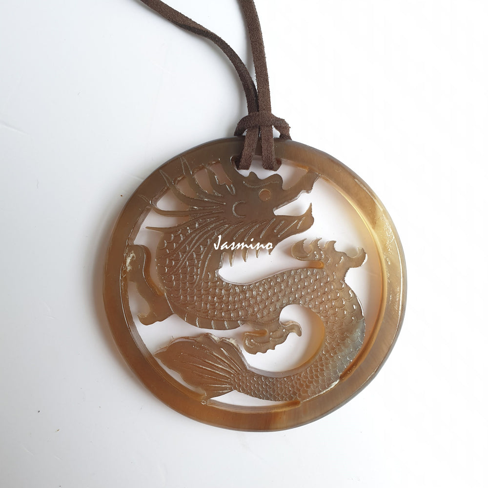 
                  
                    Jasmino antique Asian dragon oval brown pendant in natural buffalo horn for men and women
                  
                