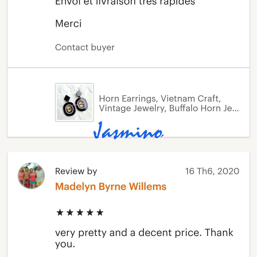 
                  
                    Two customers give positive feedback to a handmade accessory collection in a shop
                  
                