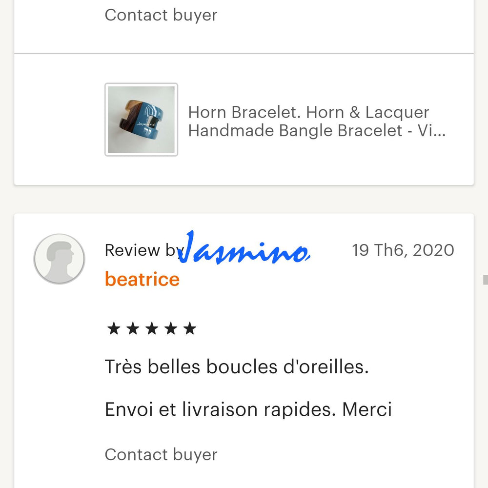 
                  
                    Two customers give good reviews for a handmade collection in a jewelry shop
                  
                