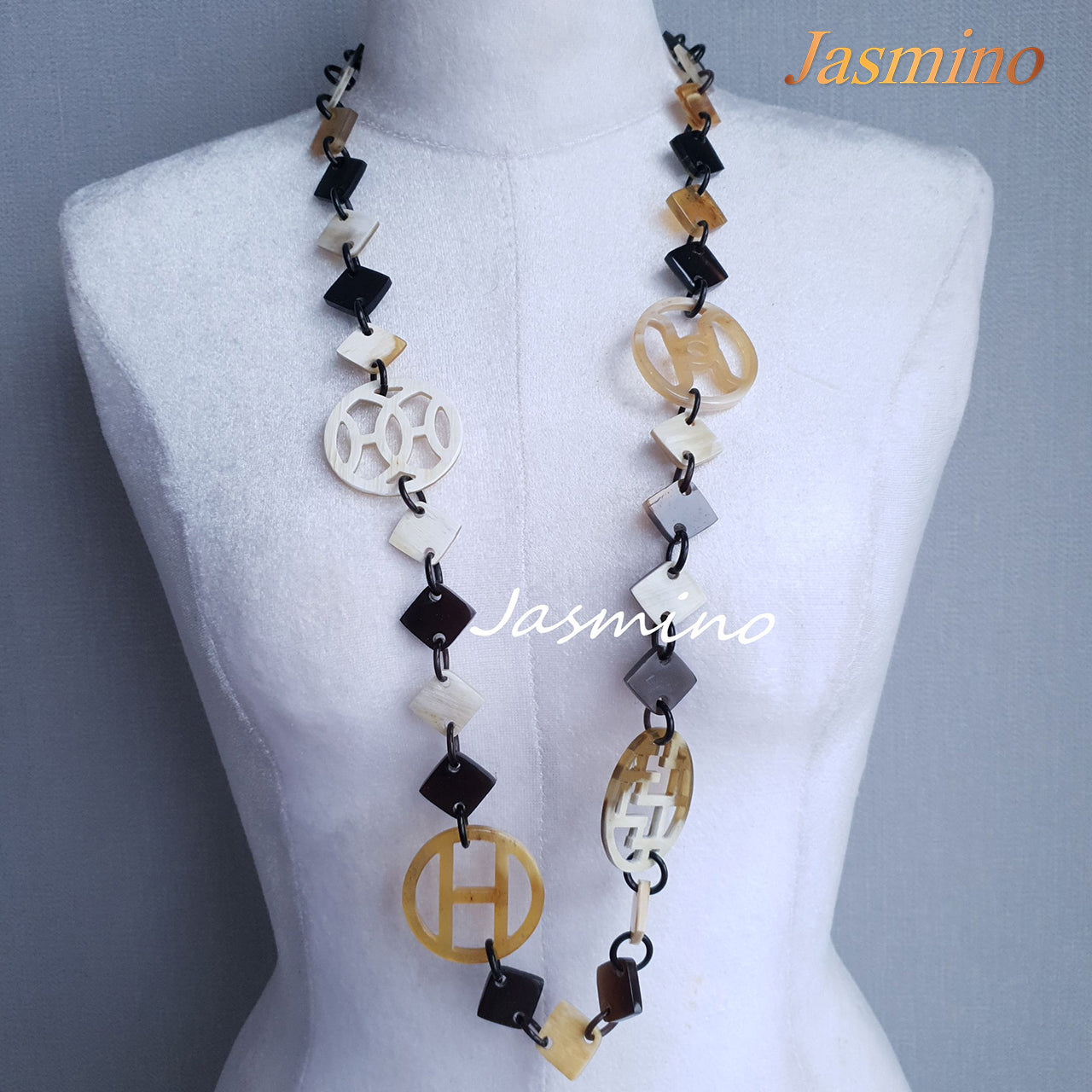 this necklace is made of lozenge buffalo horn pieces combined with unique circle horn pieces, is an impressive gift for your friend