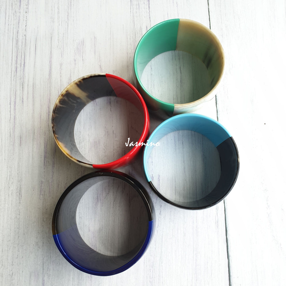 
                  
                    Four Jasmino unique handmade bangle bracelets in natural buffalo horn for women
                  
                