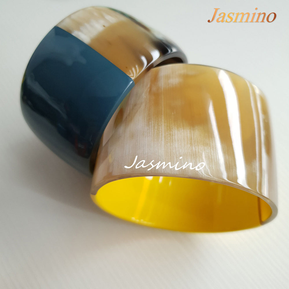 
                  
                    two Jasmino unique handmade Vintage bangle bracelets in natural buffalo horn
                  
                