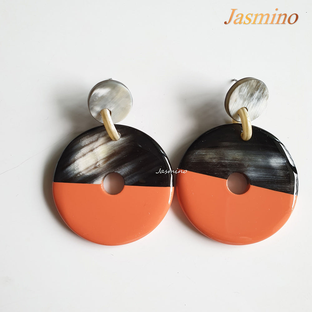 
                  
                    coin-shaped earrings are designed with half natural buffalo horn and half painted salmon in natural light, impressive gift for her 
                  
                