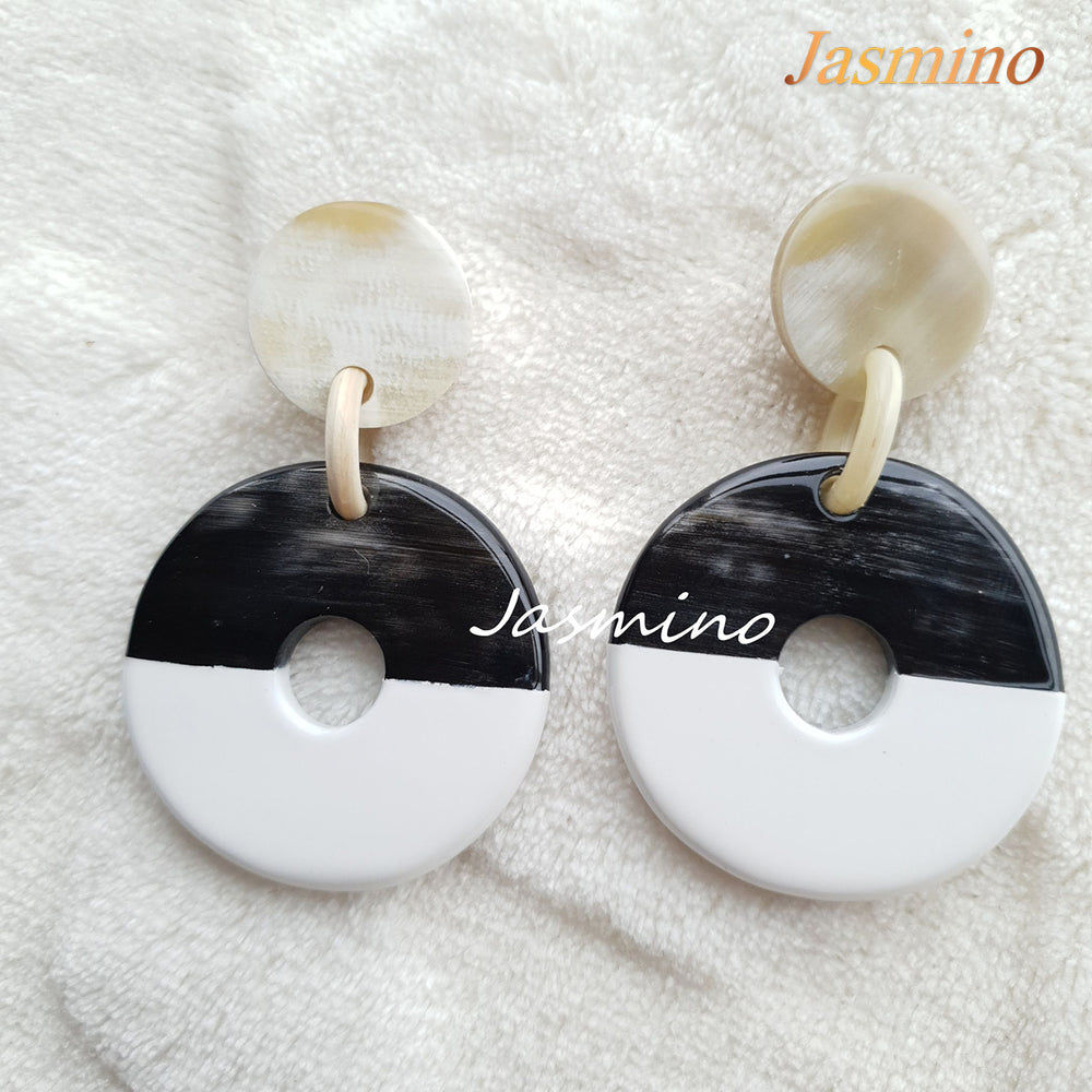 
                  
                    coin-shaped earrings are designed with half natural buffalo horn and half painted brilliant white in natural light, impressive gift for her
                  
                