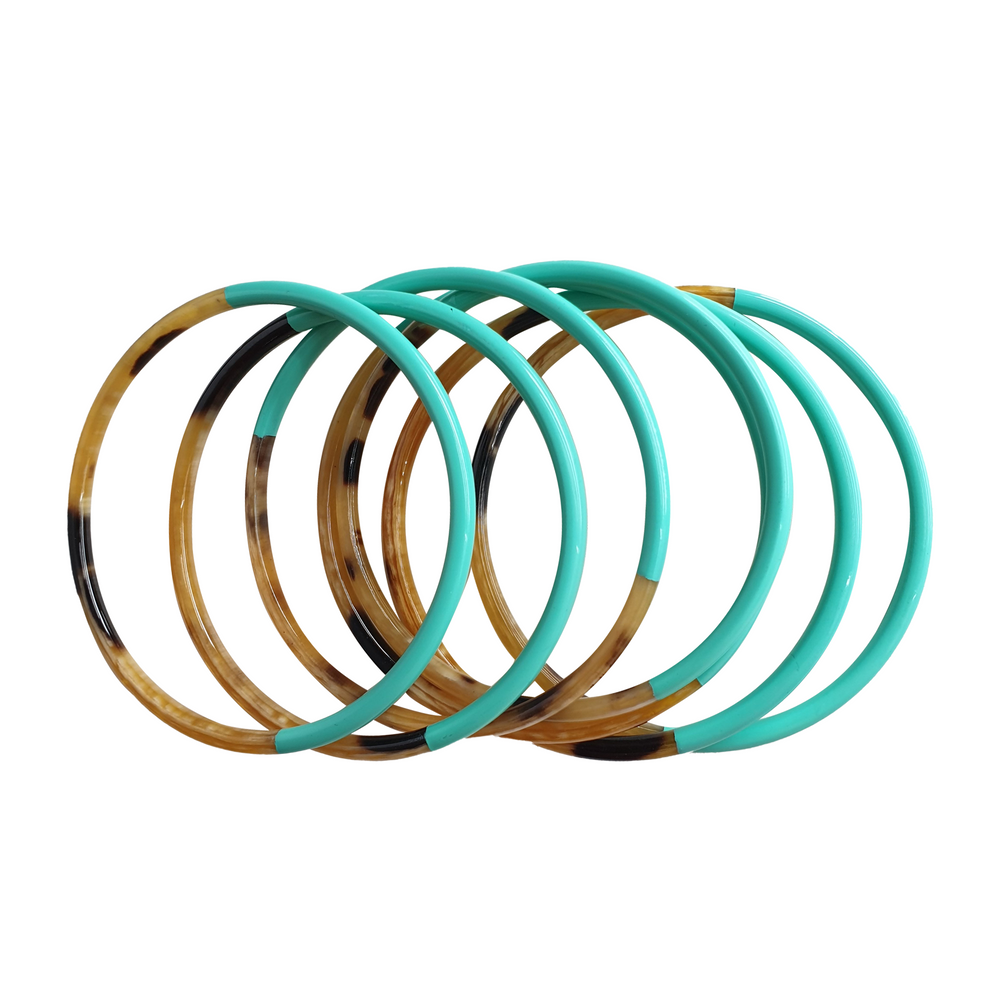 
                  
                    A turquoise half and amber half bangle bracelet for men and women in casual days and night parties
                  
                