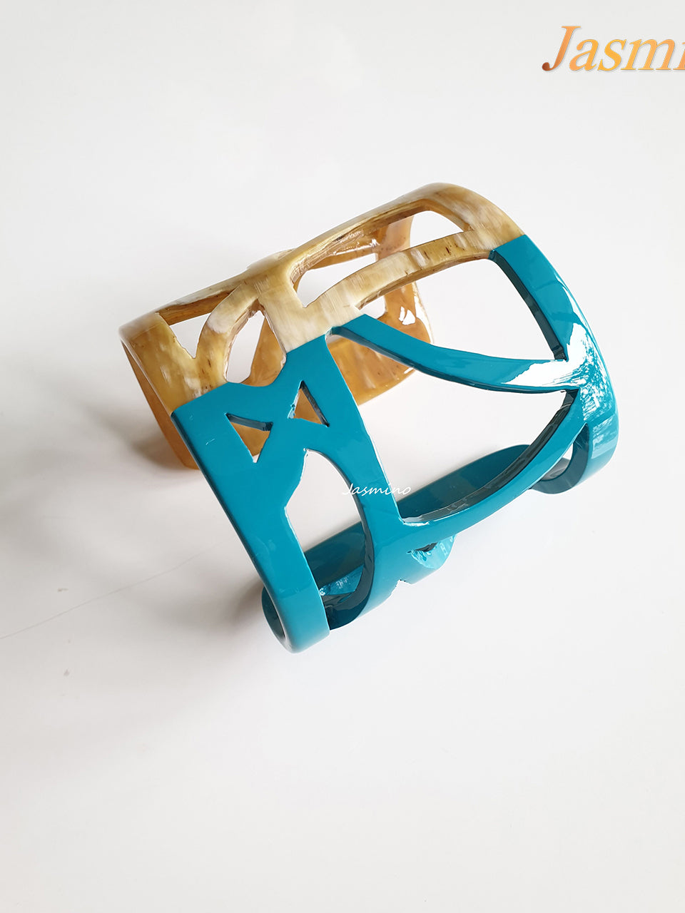 Jasmino unique handmade Ancient Ethnic cuff bracelet features a brown half and a sky blue half in natural buffalo horn for upper arm 