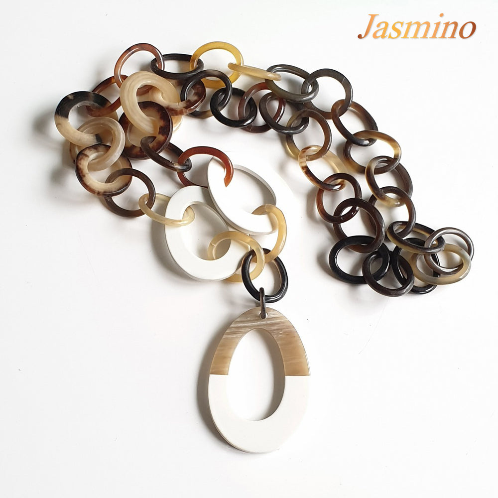 
                  
                    The necklace has some large brilliant white pieces on the light background, a unique gift for her
                  
                