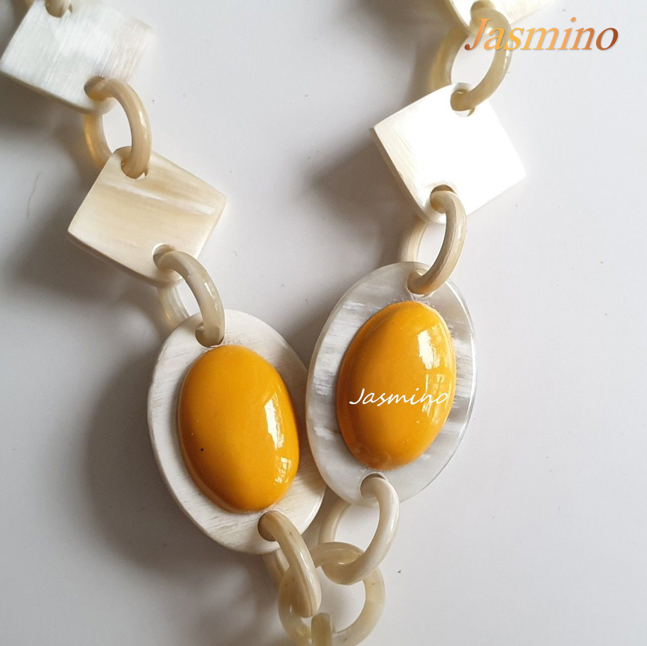 The necklace has several yellow cat-eye links, unique gift for her