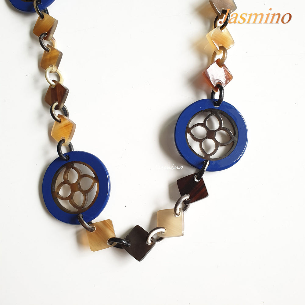 
                  
                    This necklace is made of natural lozenge buffalo horn pieces and four circle blue horn pieces with a unique pattern stands out on a light background, is a unique gift for friends
                  
                