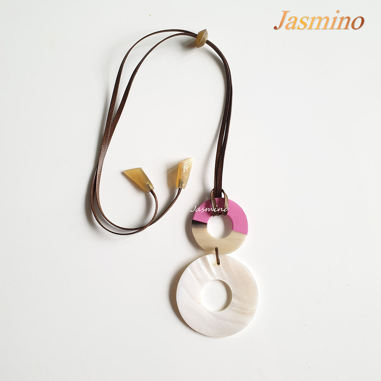 Pendant has a small circular piece with half natural horn and half pink lacquer unique gift for her