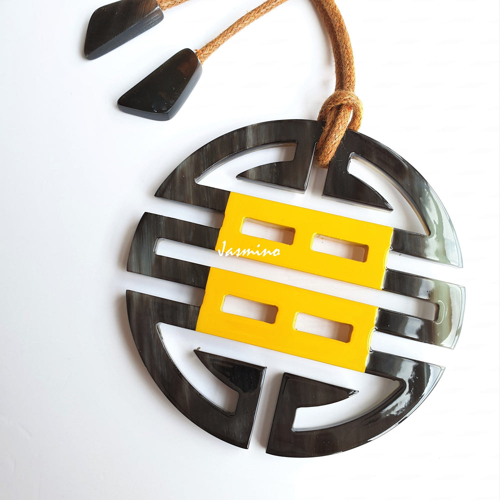 
                  
                    unique handmade Asian Ethnic Vintage circle pendant features black and yellow in natural buffalo horn for women
                  
                