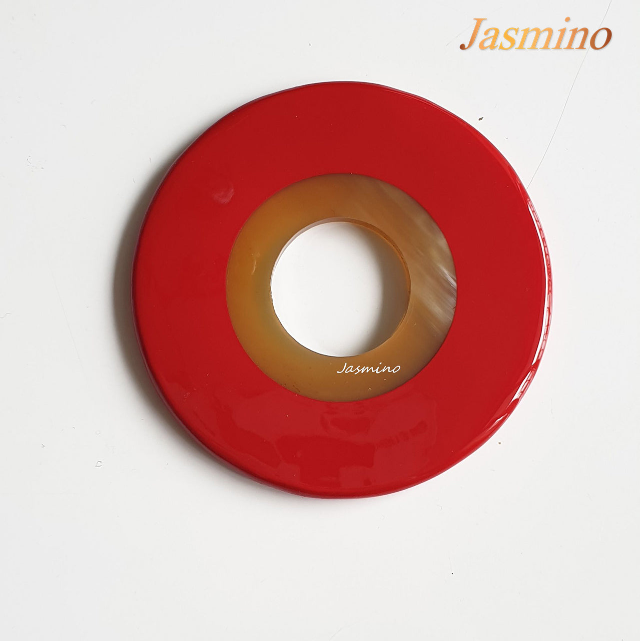 round red maple horn pendant on the light background, impressive Christmas gift for her