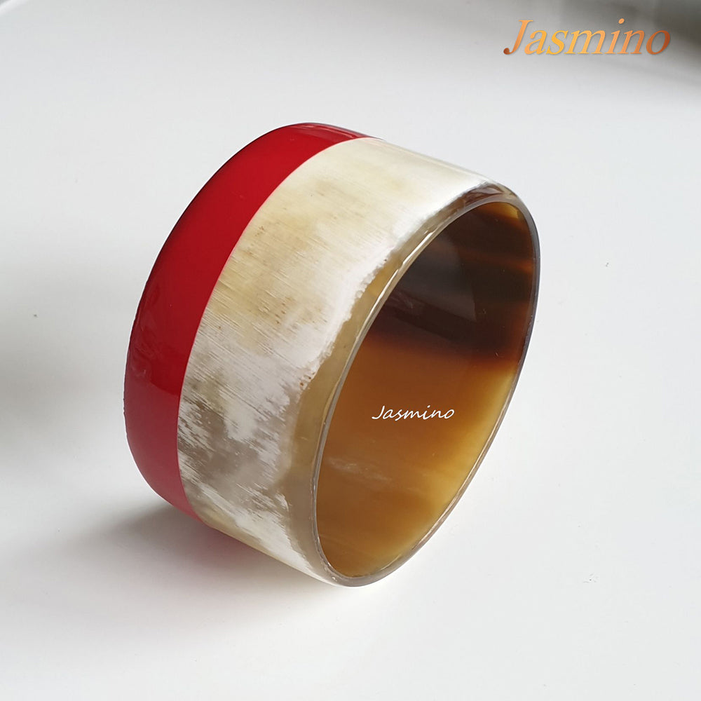 
                  
                    Jasmino unique handmade Christmas bangle bracelet features red and white in natural buffalo horn for women
                  
                