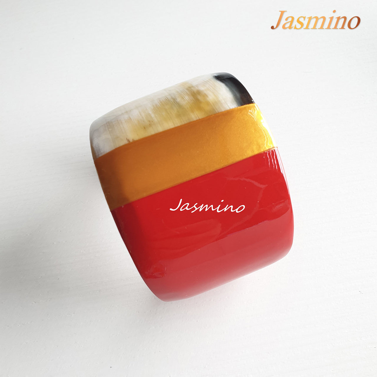 Jasmino unique handmade cuff bracelet features brown, red, and yellow in natural buffalo horn for women on Christmas gifts