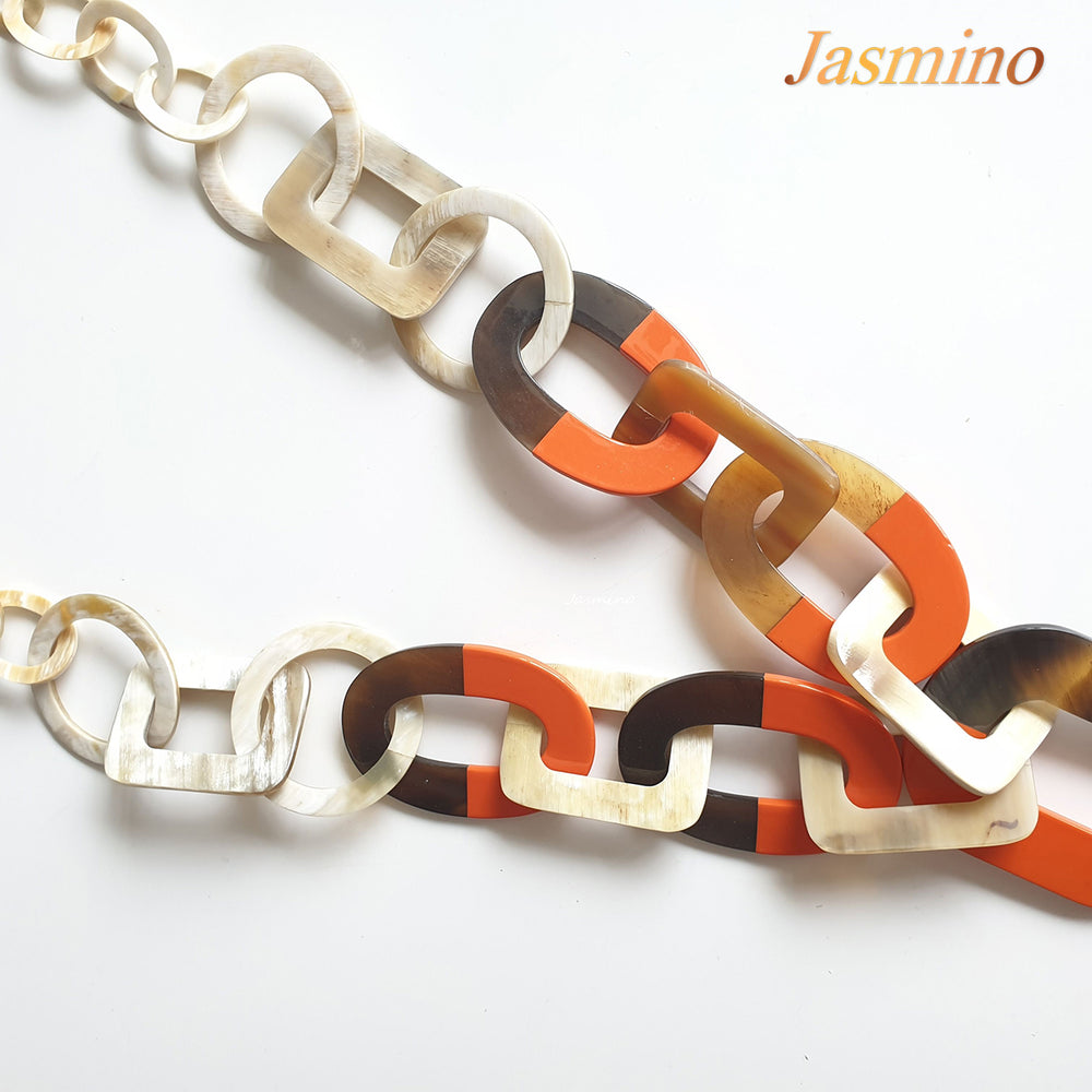 
                  
                    The necklace has large pieces with half natural horn and half orange peel lacquer, unique gift for her
                  
                