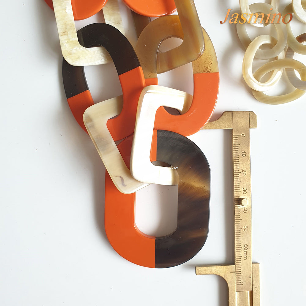 
                  
                    The necklace has large pieces with half natural horn and half orange peel lacquer, unique gift for her
                  
                