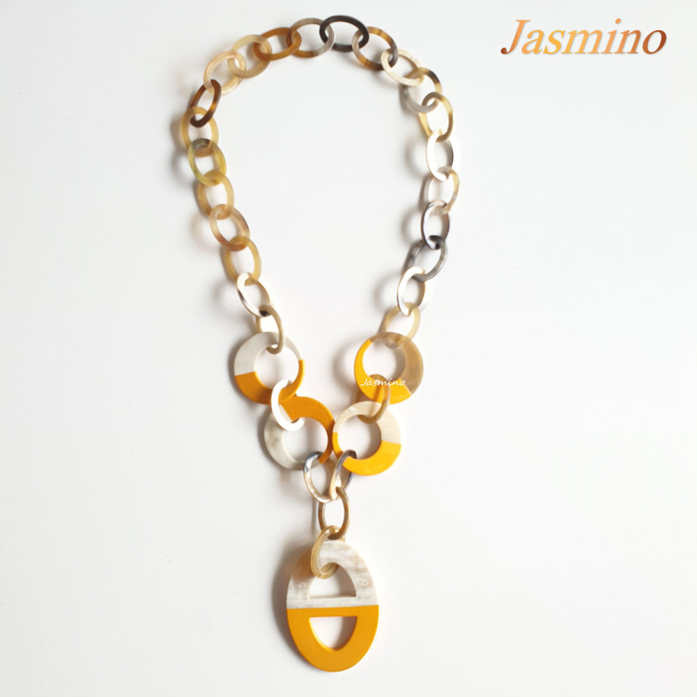 
                  
                    The necklace has large pieces with half natural horn and half yellow lacquer, unique gift for her
                  
                