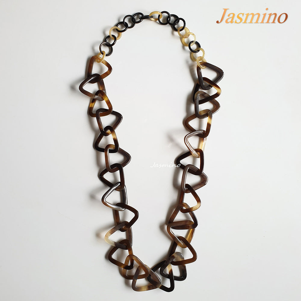 
                  
                    chain triangle buffalo horn necklace in natural light, unique gift for your friend
                  
                