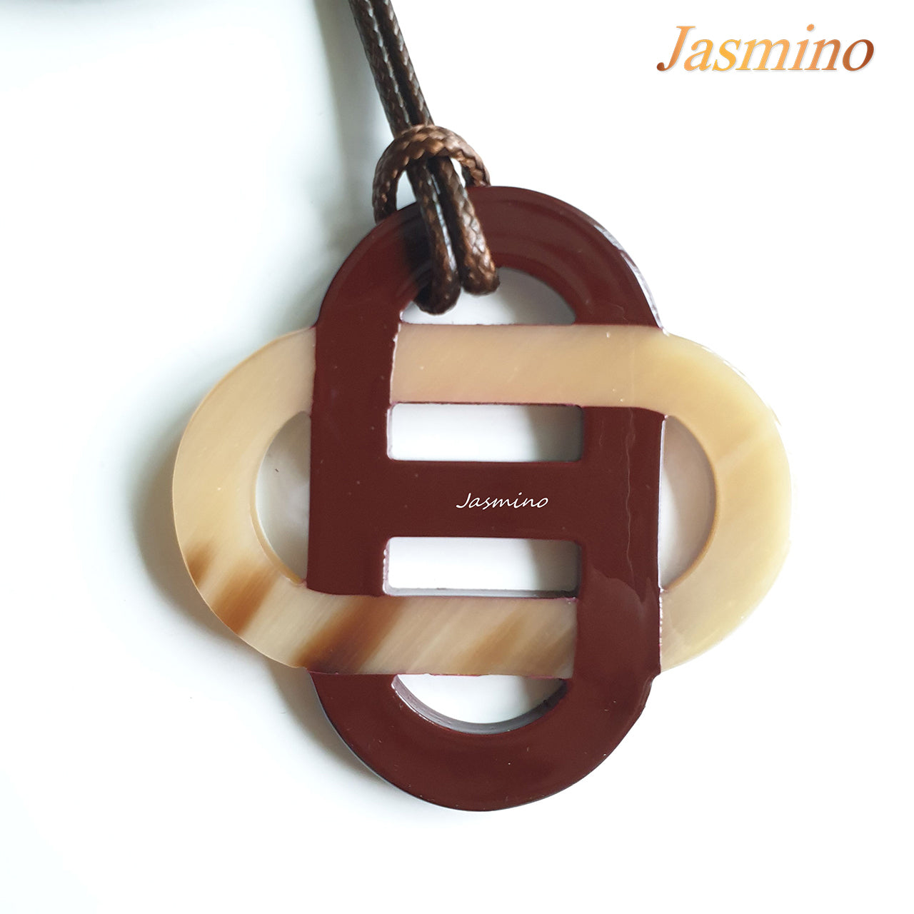 fired brick lacquer pendant on the light background, impressive gift for her