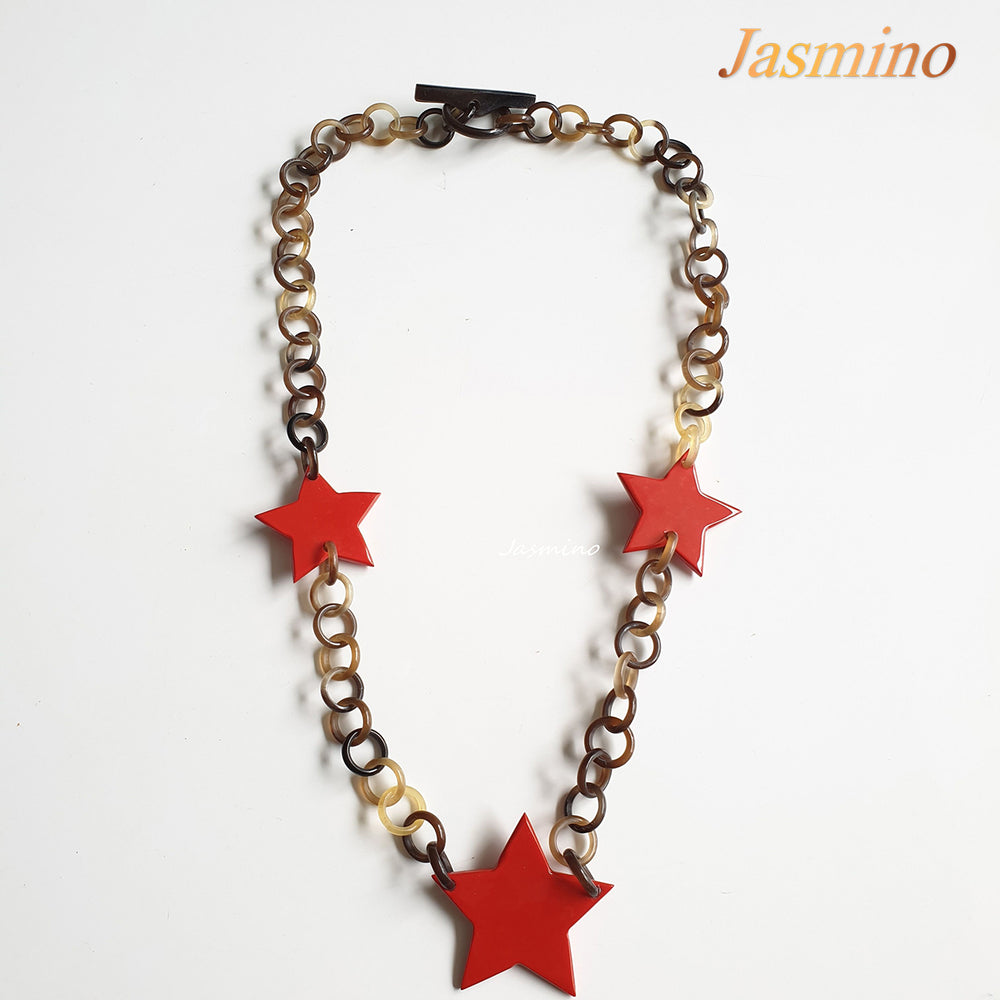 
                  
                    The necklace has several power red triangular in the light background, unique gift for her
                  
                