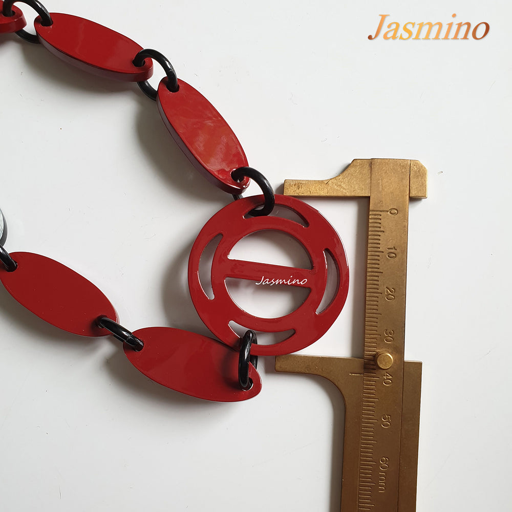 
                  
                    The necklace has some cherry pieces on the light background, a unique gift for her
                  
                