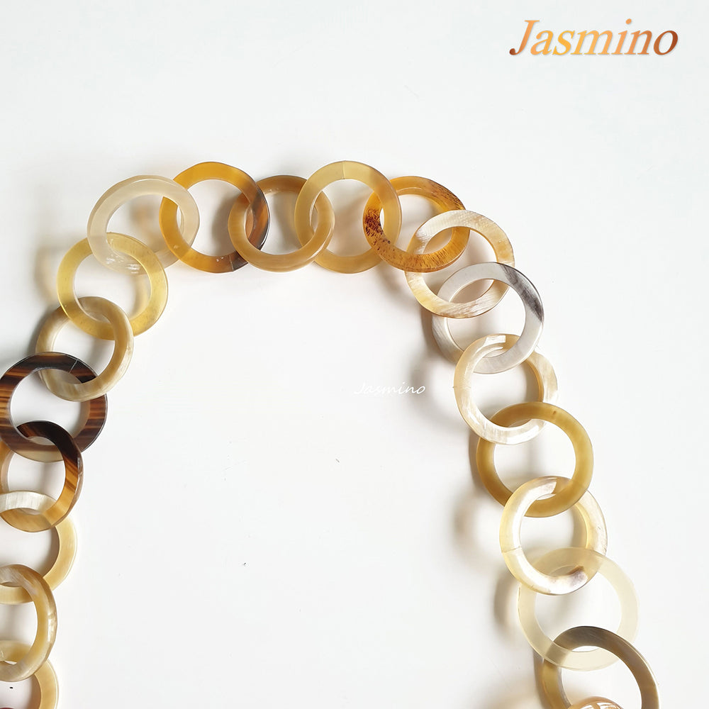 
                  
                    The necklace consists of pieces of natural buffalo horn: circle pieces, rectangle pieces and elliptical flame scarlet pieces connected together with each other, impressive Christmas gift for your friend
                  
                