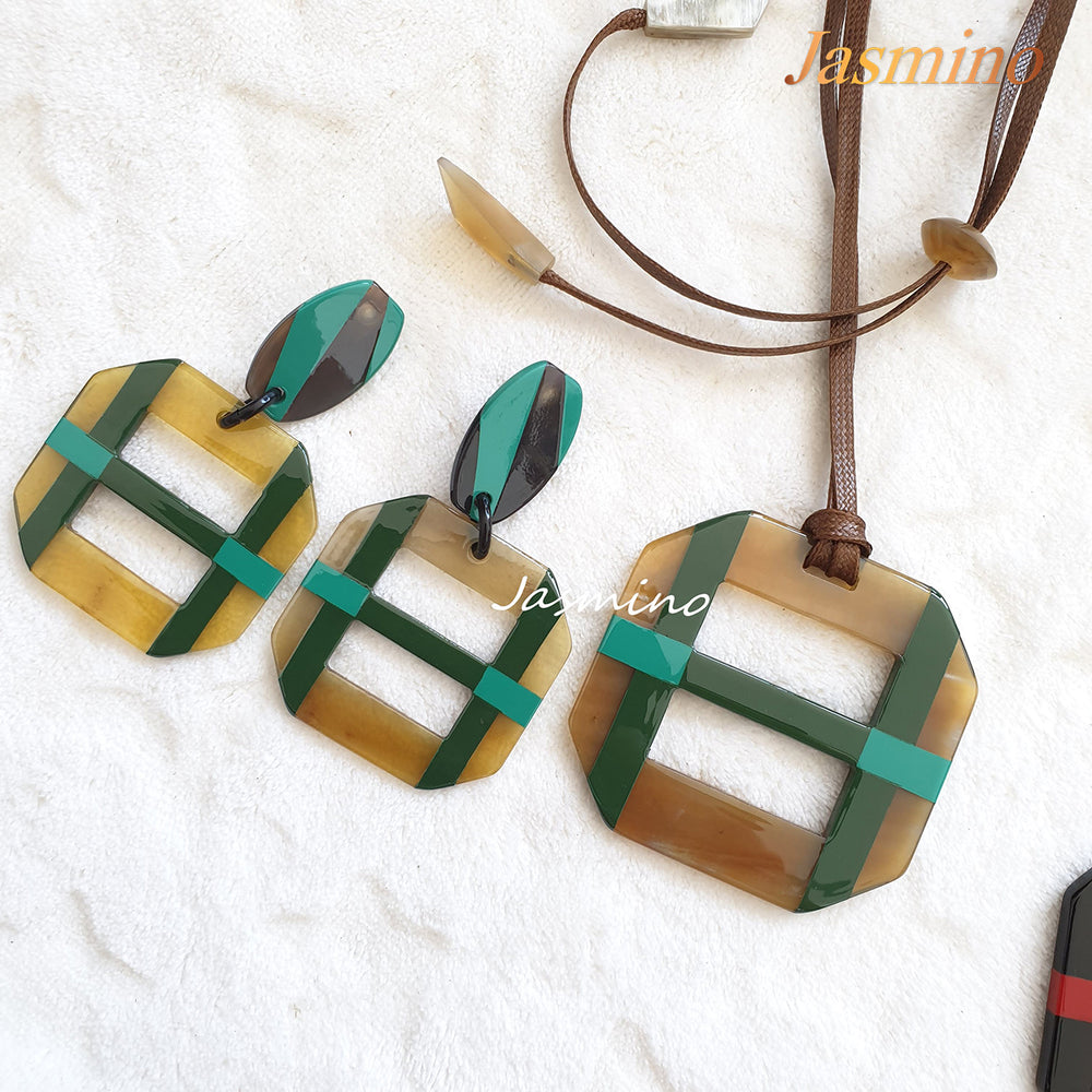 
                  
                    A set of unique handmade Christmas square drop earrings and pendant necklace features green in natural buffalo horn
                  
                