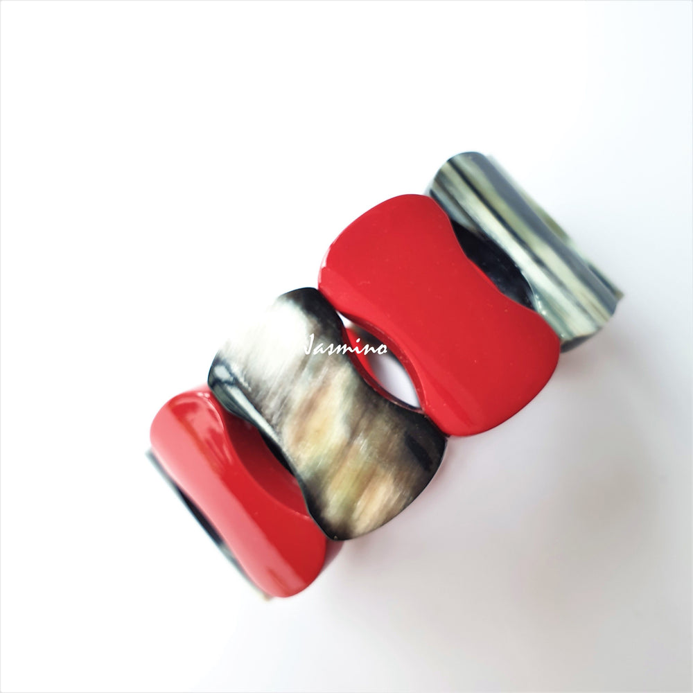 
                  
                    Jasmino unique handmade bangle bracelet features orange in natural buffalo horn for women's gifts
                  
                