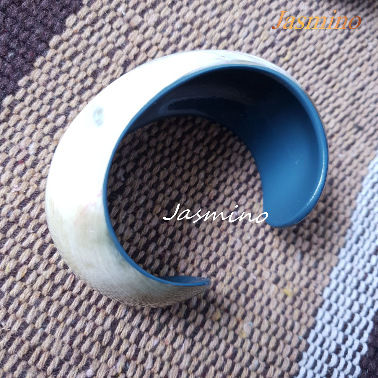 Jasmino unique handmade Vintage white cuff bracelet is shaped a snail shell with a light blue inside that is made of natural buffalo horn for the best gifts