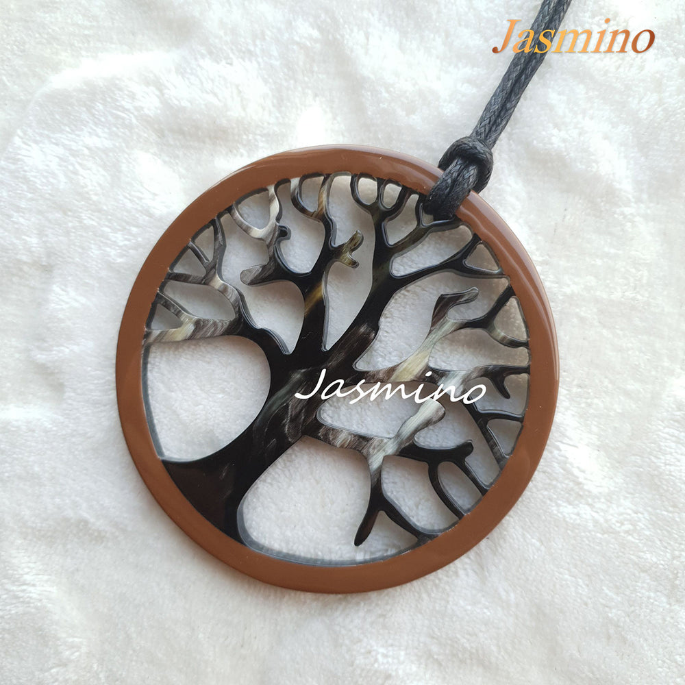
                  
                    circular pendant is designed with brown outline, inside with a tree pattern made of unique natural buffalo horn on a light background, impressive gift for her 
                  
                