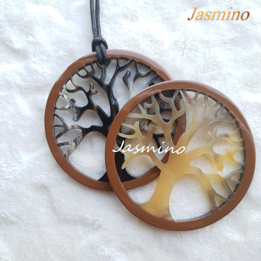 
                  
                    Two circular pendants are designed with brown outline, inside with a tree pattern made of unique natural buffalo horn on a light background, impressive gift for her
                  
                