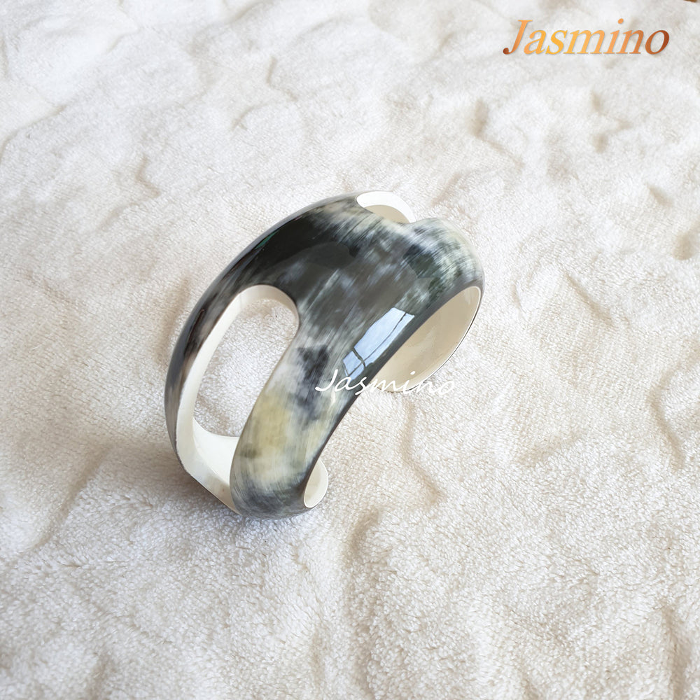 
                  
                    bracelet that the main color outside is white combine black while inside is brilliant white, Unique gift for her 
                  
                