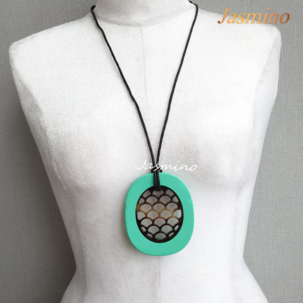 
                  
                    fish scale turquoise pendant on the light background, impressive gift for her
                  
                