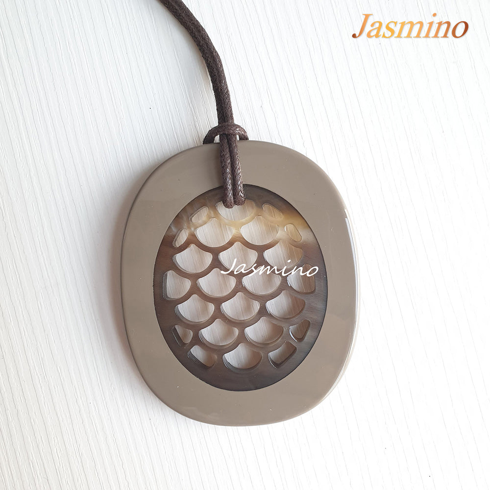 
                  
                    fish scale taupe pendant on the light background, impressive gift for her
                  
                