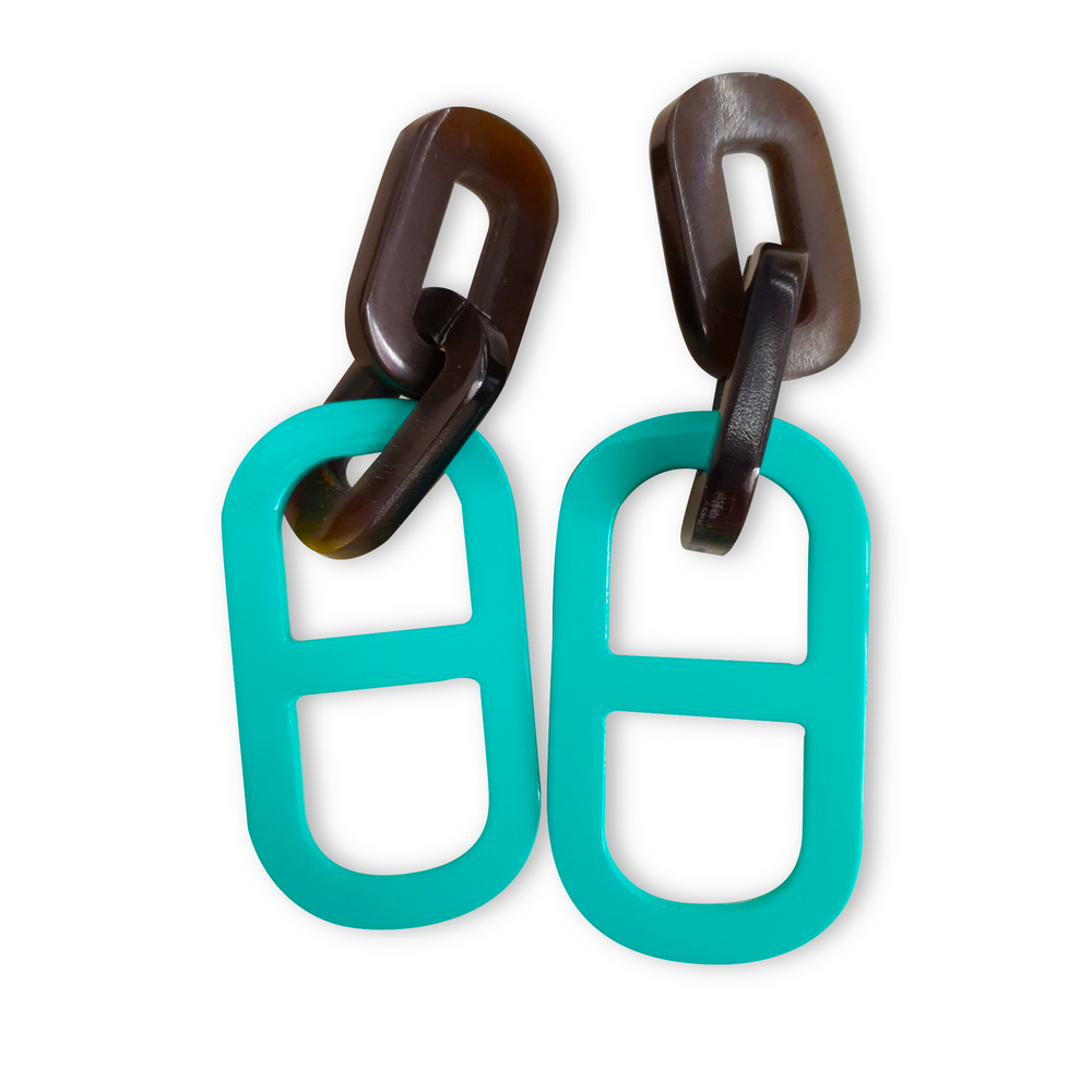 
                  
                    Jasmino unique handmade earrings feature a paperclip shape with turquoise and brown color made of natural buffalo horn
                  
                