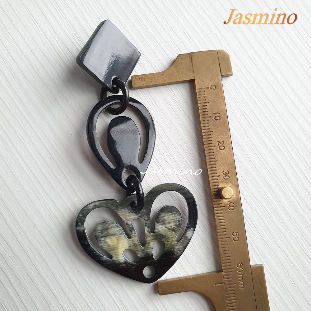 
                  
                    Unique handmade black heart earrings are made of natural buffalo horn for couple jewelries
                  
                