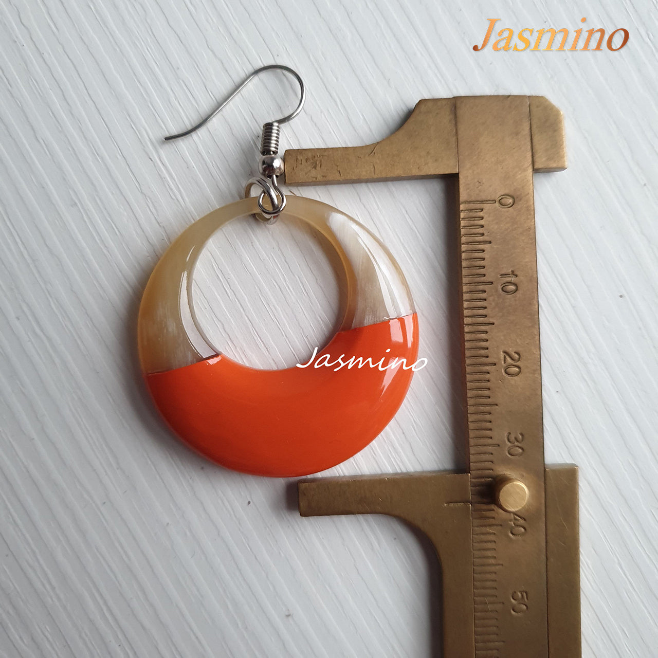 Unique handmade Vintage crescent moon dangle earrings feature orange made of natural buffalo horn